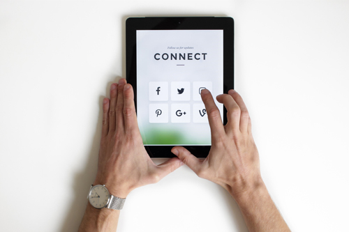 Ipad with social media icons